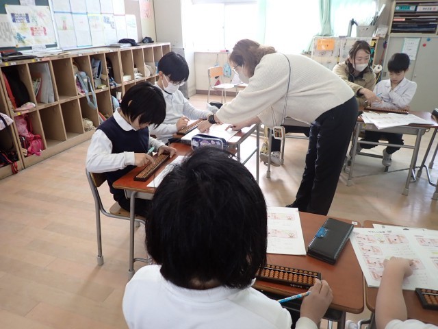 そろばん指導